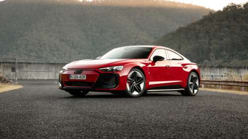 A high-detail shot of a red Audi RS e-tron GT electric sports sedan. wallpaper
