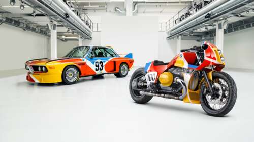 An intricately detailed BMW 1.8 CSL art vehicle featuring vibrant, multi-colored... wallpaper