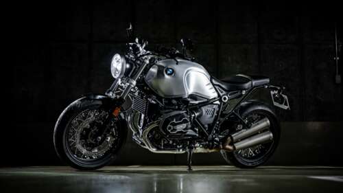 A cinematic, dark-toned close-up of the BMW R nineT Final Edition 2023 motorcycle... wallpaper