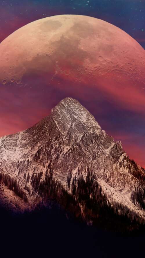Crimson Eclipse over Snowy Mountain Peaks