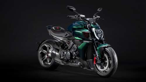 A high-detail, cinematic shot of the limited edition Ducati Diavel for Bentley motorcycle... free wallpaper