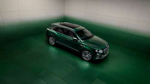 A luxurious bespoke vehicle design featuring a deep emerald green aesthetic and high-resolution... free wallpaper