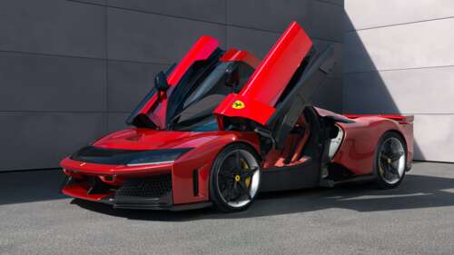 A sleek and aerodynamic 2025 Ferrari F80 supercar in a striking vibrant red color. free wallpaper