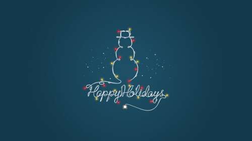 A happy snowman decorated with bright, colorful Christmas lights on a wintry blue... wallpaper