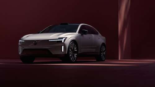 A high-resolution, detailed view of a modern 2025 electric sedan featuring an aerodynamic... free wallpaper