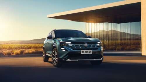 A high-resolution 5K shot of a modern 2025 SUV with a streamlined, futuristic body... wallpaper