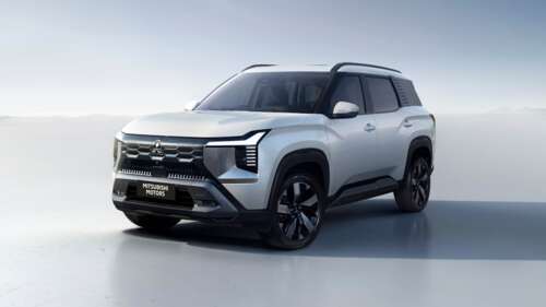 A high-resolution, detailed render of a modern 2026 crossover SUV with a futuristic... free wallpaper