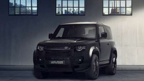 A collection of high-end, glossy black cars with futuristic aerodynamic designs in... free wallpaper