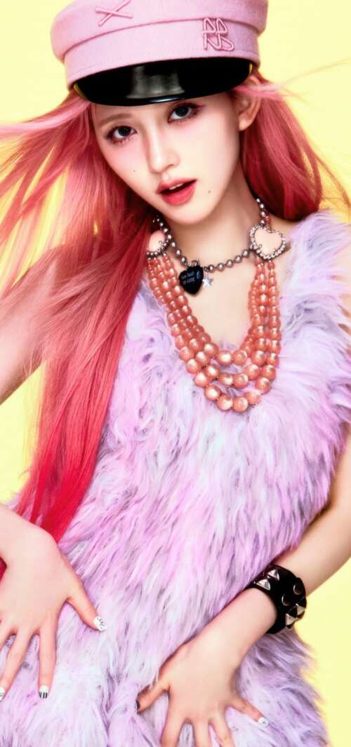 A high-definition portrait of Gaeul from the K-pop group IVE featuring a vibrant... download free phone wallpaper