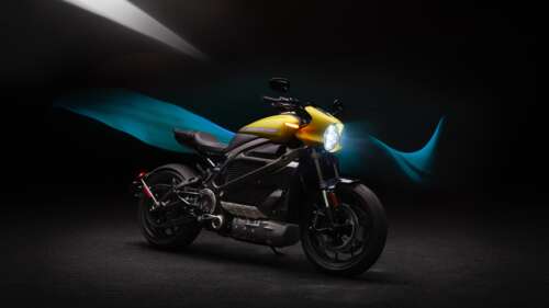 A detailed view of a Harley-Davidson LiveWire electric motorcycle against a dark... wallpaper