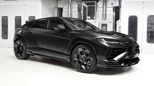 A sleek, all-black 2025 Lamborghini Urus R’Evo Stealth Edition featuring intricate... wallpaper download