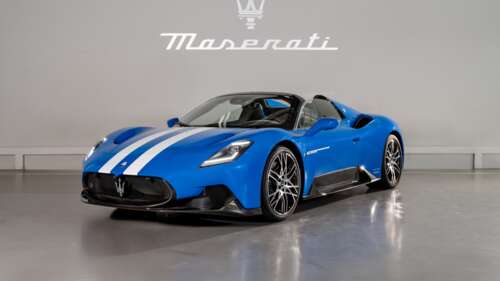 A high-resolution, detailed close-up of a luxury Maserati MC20 supercar featuring... wallpaper
