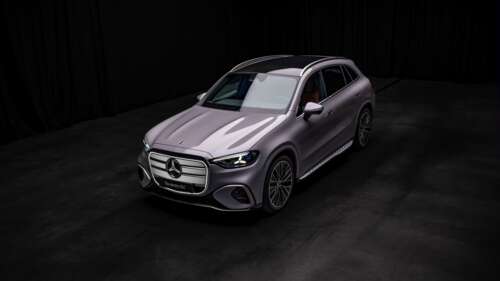 High-resolution 8K shot of a Mercedes-Benz GLC 400 luxury SUV against a dark, dramatic... wallpaper