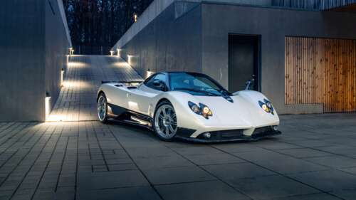 A high-resolution, detailed shot of a Pagani Zonda F hyper sports car featuring sleek... wallpaper