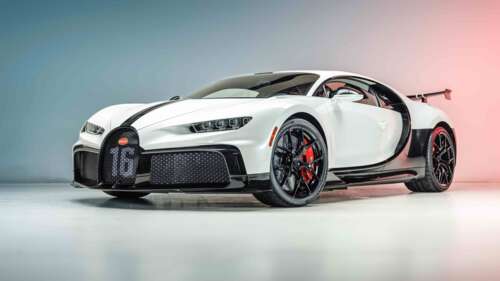 A high-resolution, aesthetic shot of a white Bugatti Chiron Pur Sport hypercar showcasing... free wallpaper