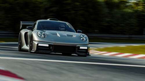 High-performance RML P39 Special Edition Porsche 911 Turbo S racing on a track free wallpaper