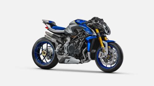 A rugged street fighter riding a powerful motorcycle through a cinematic, dark urban... wallpaper