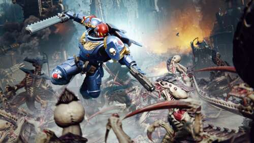 Lieutenant Titus of the Ultramarines from Warhammer 40,000: Space Marine 2 engaging... wallpaper
