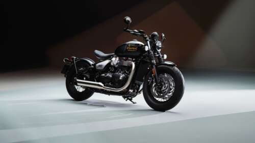 High-resolution cinematic shot of the Triumph Bonneville Bobber TFC motorcycle featuring... wallpaper