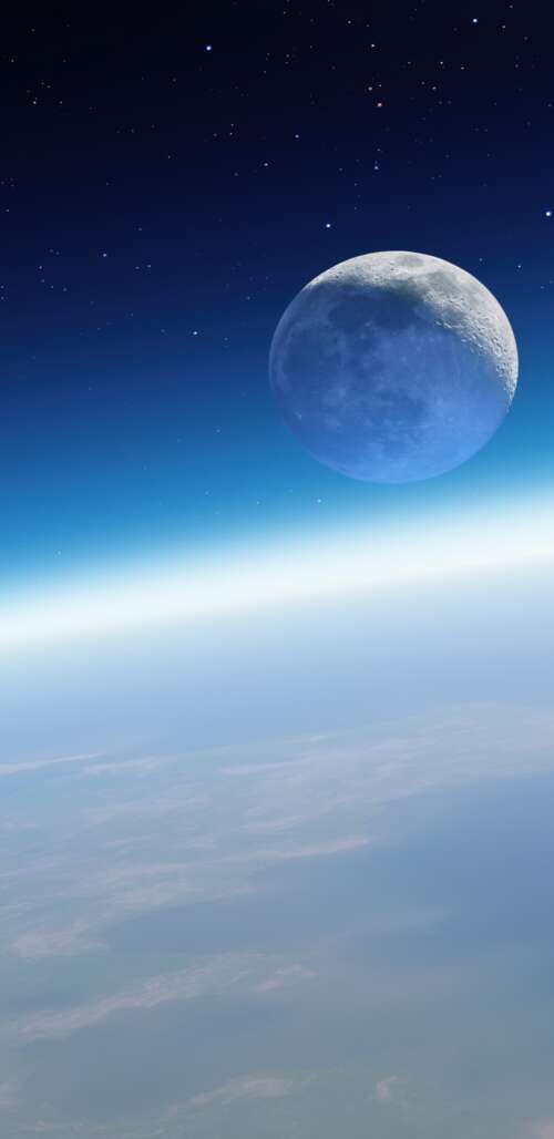 A high-resolution cinematic view of Earth and the Moon floating in a star-filled... wallpaper