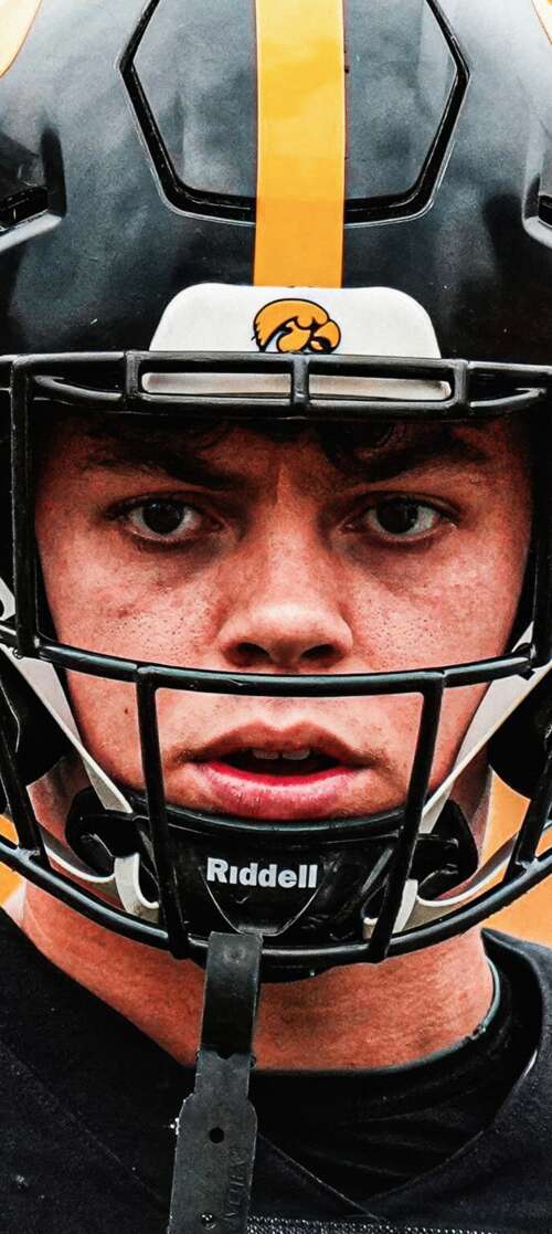 Cooper DeJean, American football player for the Iowa Hawkeyes, in high-detail athletic... wallpaper