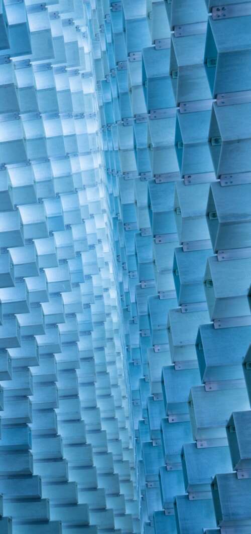 Detailed view of geometric patterns and architectural textures in a modern exhibition... free wallpaper