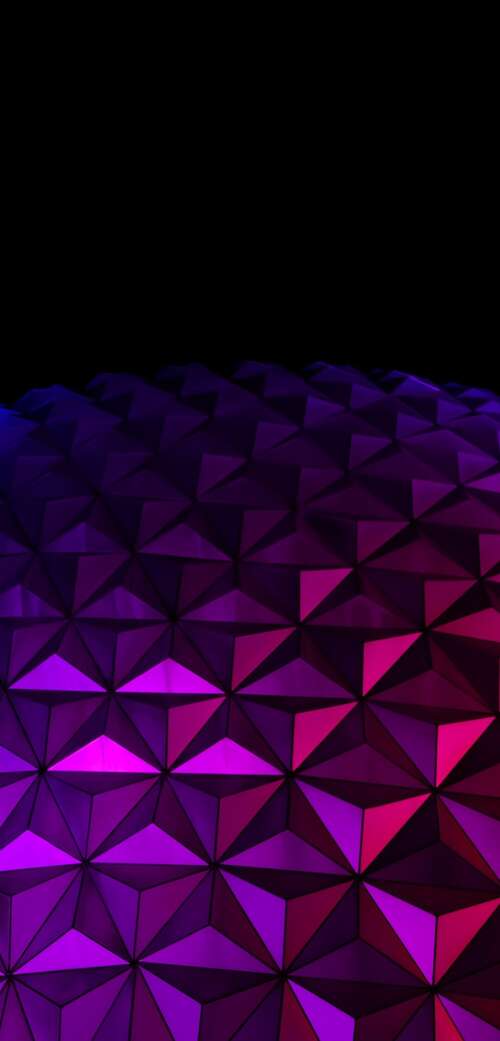 The illuminated Spaceship Earth sphere at Epcot, Walt Disney World, set against a... wallpaper