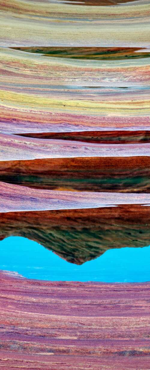 Vibrant orange and red swirling sandstone rock formations of The Wave in Arizona. wallpaper