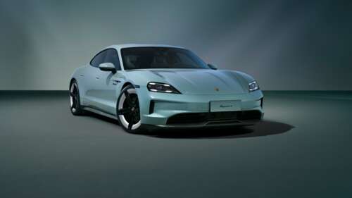 A high-resolution, detailed shot of a 2024 Porsche Taycan electric sports car showcasing... wallpaper