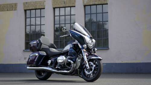 Detailed close-up of a 2021 BMW R 18 Transcontinental touring motorcycle with chrome... wallpaper download
