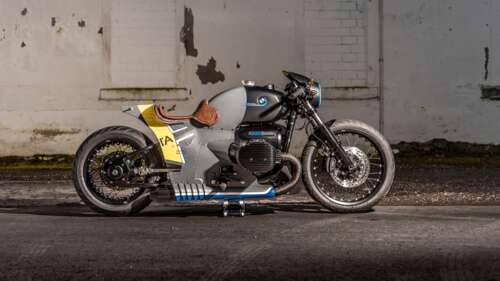 A highly detailed 2023 BMW R 18 custom motorcycle named Iron Annie, featuring a rugged... wallpaper