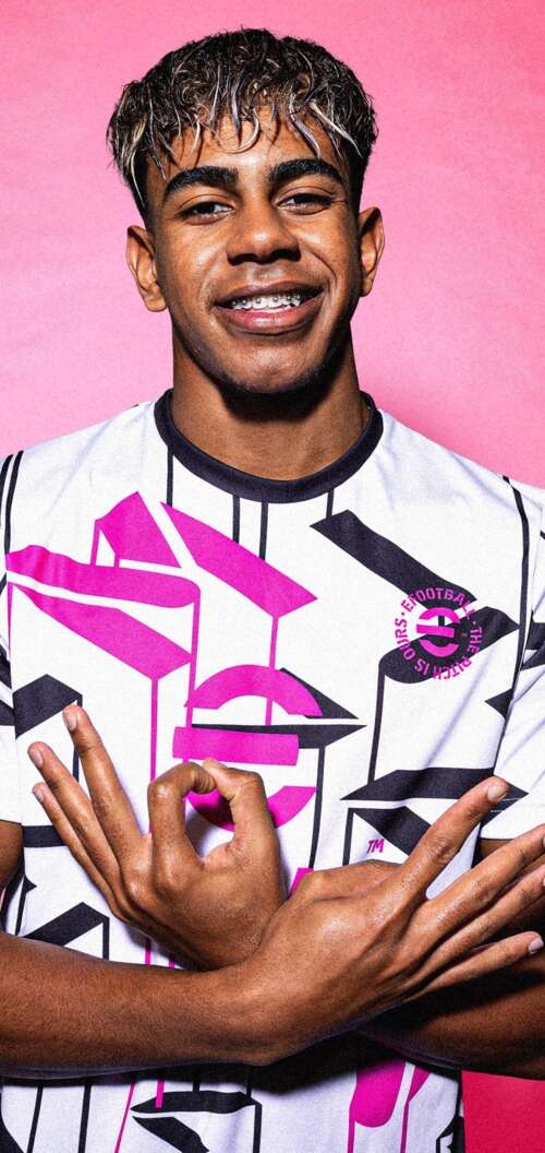 An FC Barcelona football player set against a bright pink background in the style... wallpaper