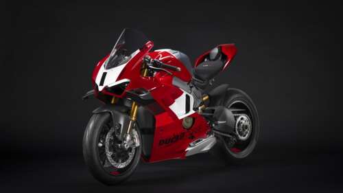 A high-detail, cinematic shot of a 2023 Ducati Panigale V4 R motorcycle against a... wallpaper