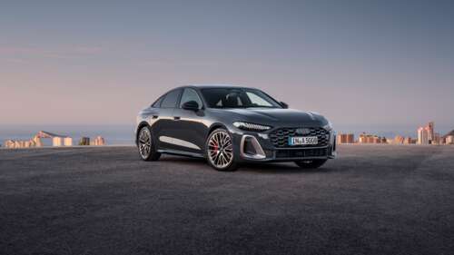 A high-resolution, detailed view of the 2024 Audi A5 luxury car. wallpaper