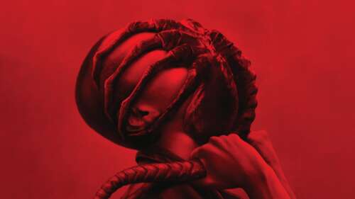 A cinematic poster of the Xenomorph from the movie Alien: Romulus set against a dramatic... wallpaper