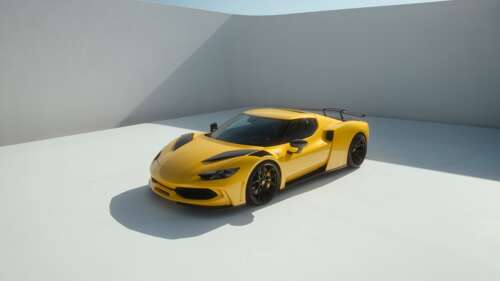 A bright yellow Novitec Ferrari 296 GTB showcasing its custom aerodynamic body kit... wallpaper
