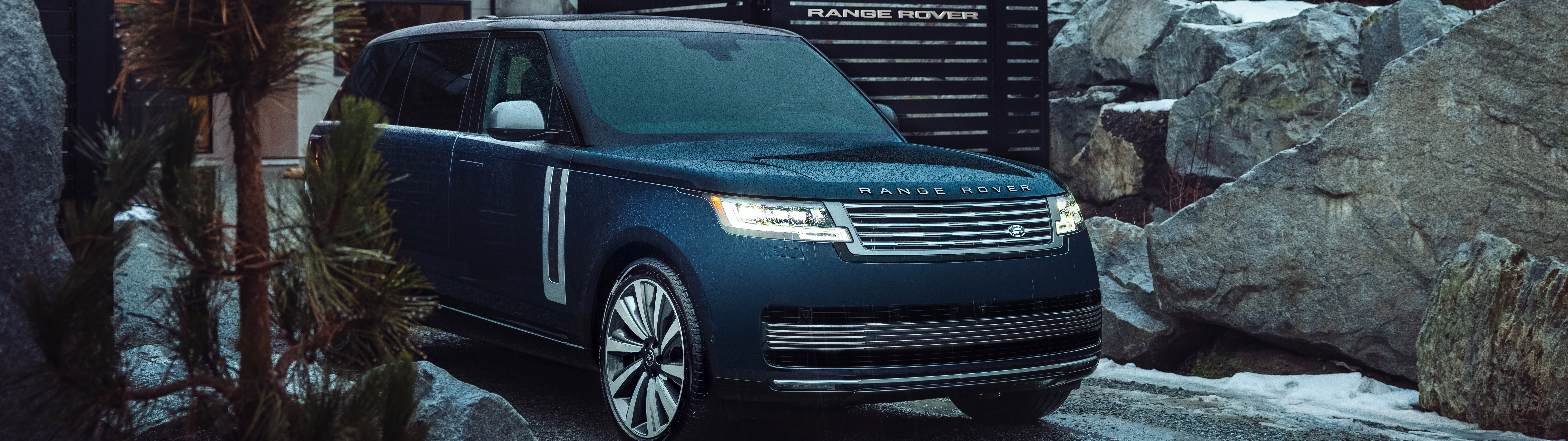 A sleek and luxurious Range Rover SV automobile featuring a premium metallic finish and modern design.