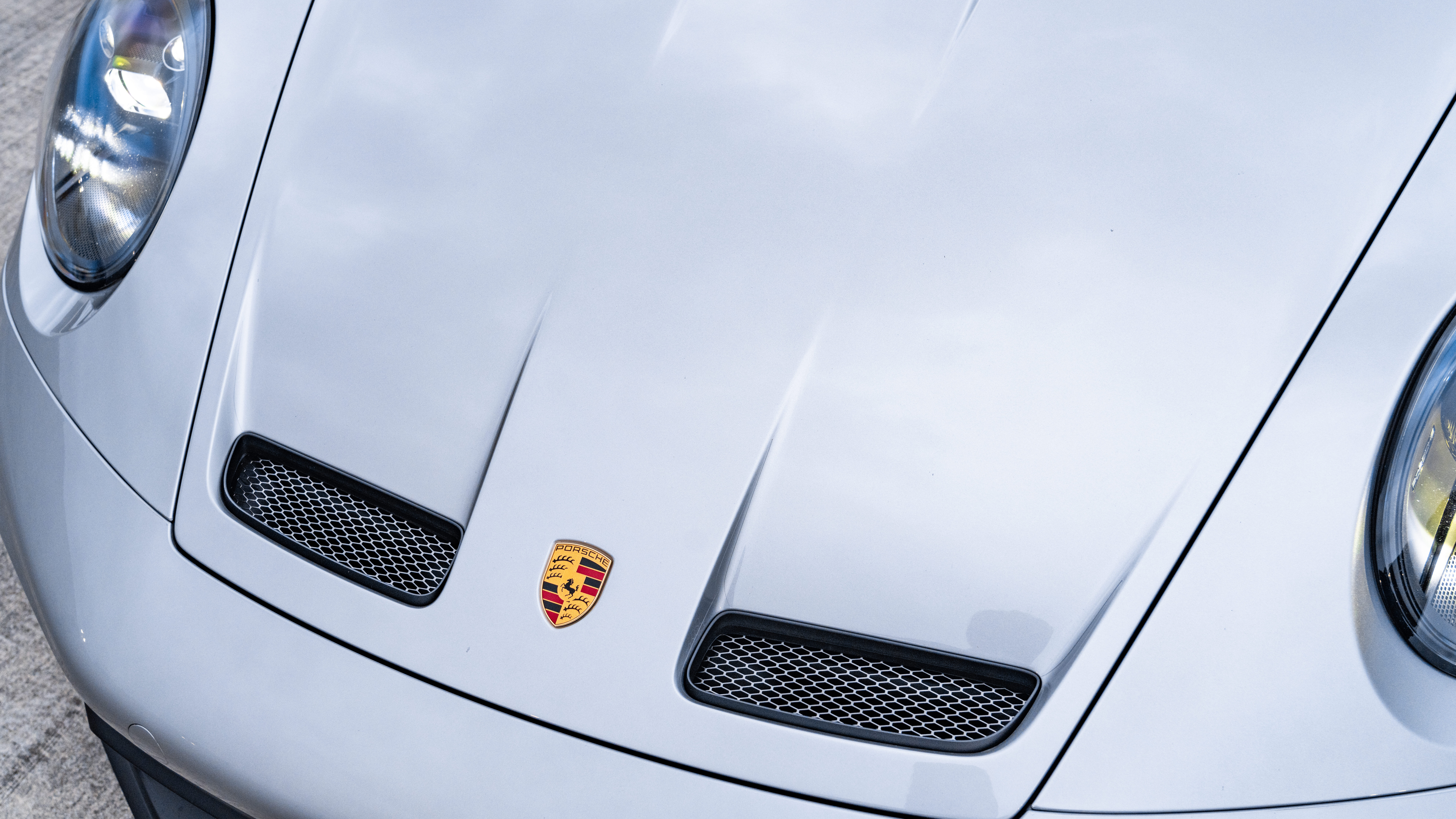 A high-performance Porsche GT3 RS sports car showcasing its sleek aerodynamic design.