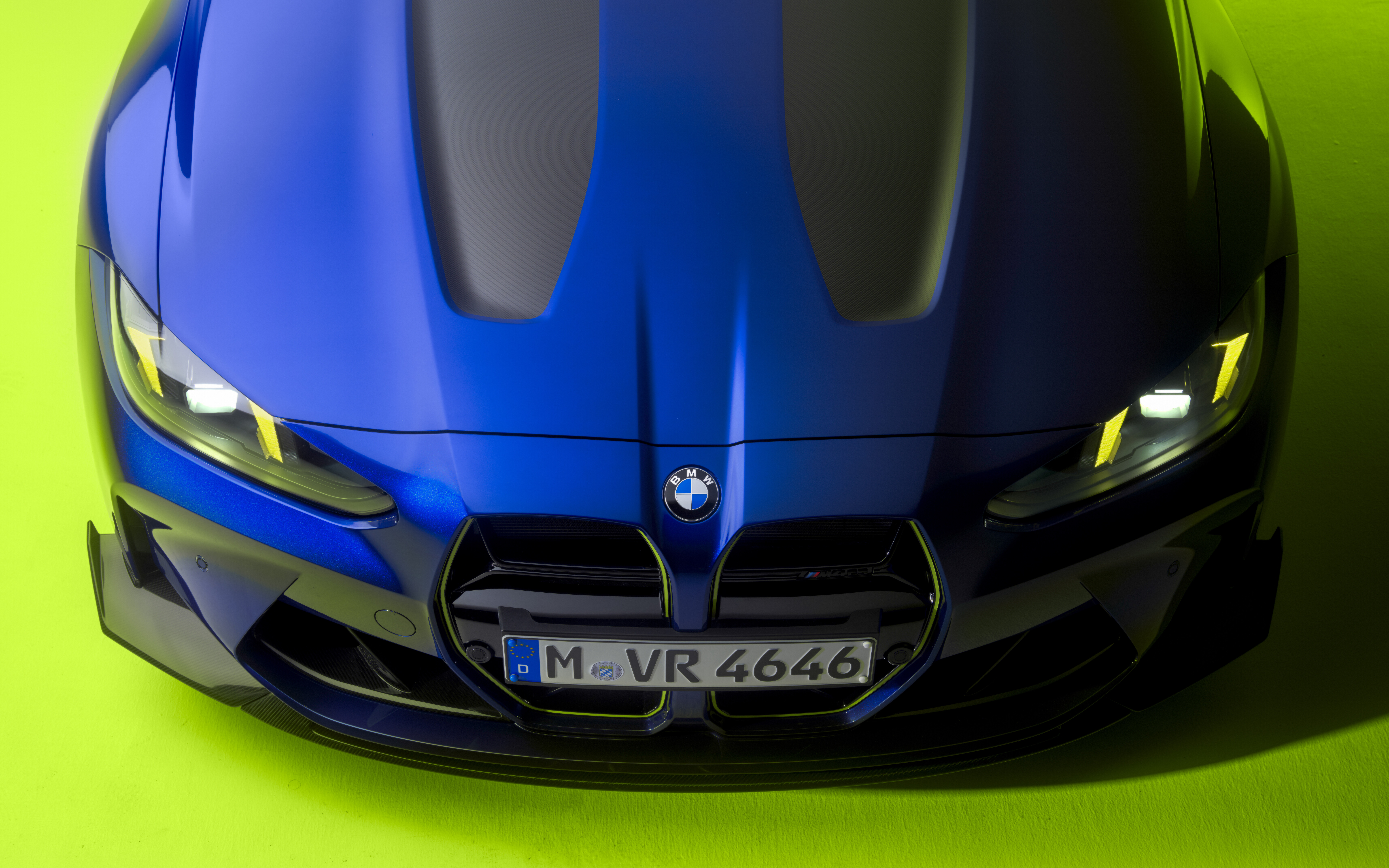 BMW M4 CS Edition featuring the iconic yellow and blue VR46 livery of MotoGP legend Valentino Rossi