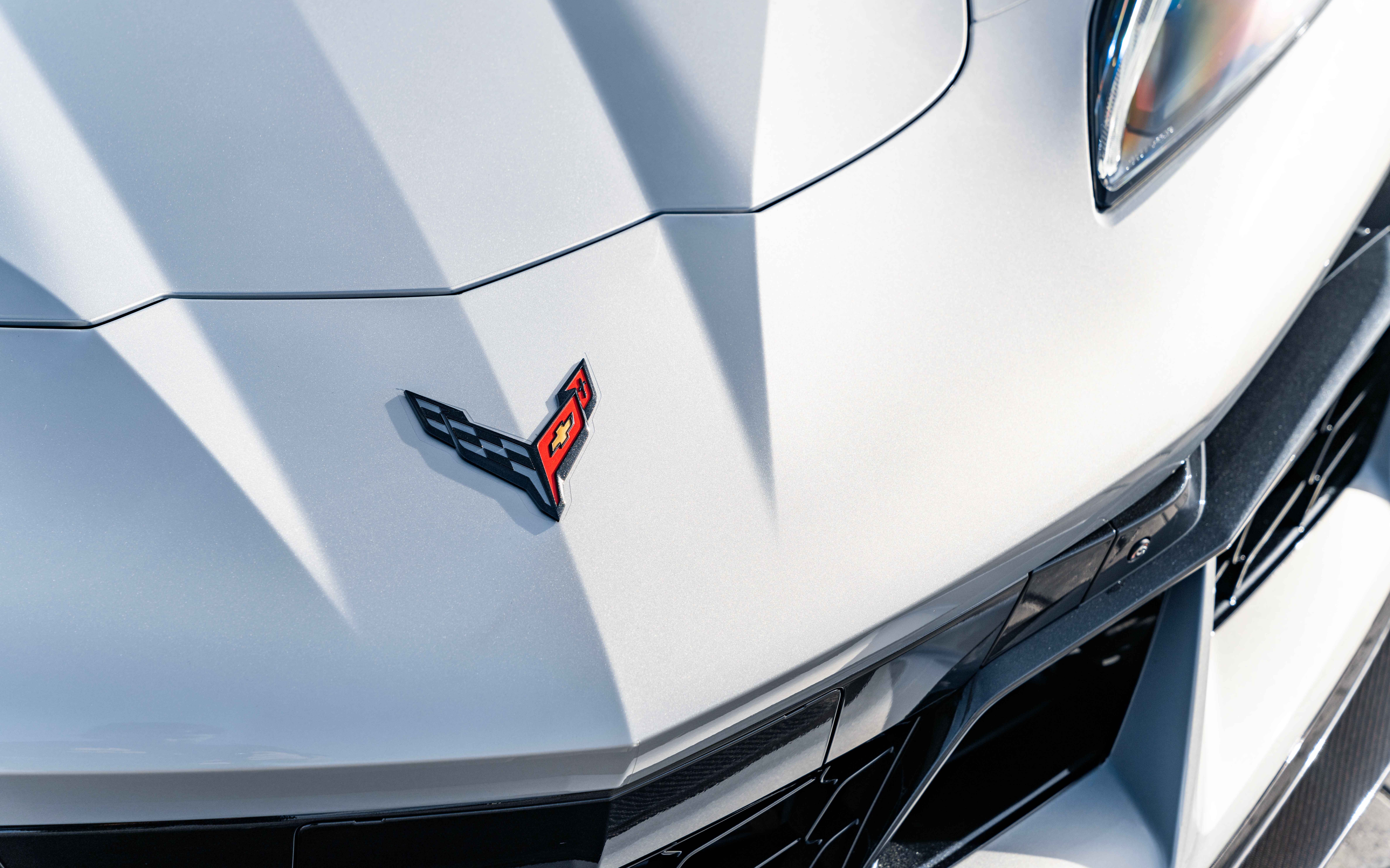 A sleek and aerodynamic Chevrolet Corvette C8 sports car showcasing its mid-engine design.