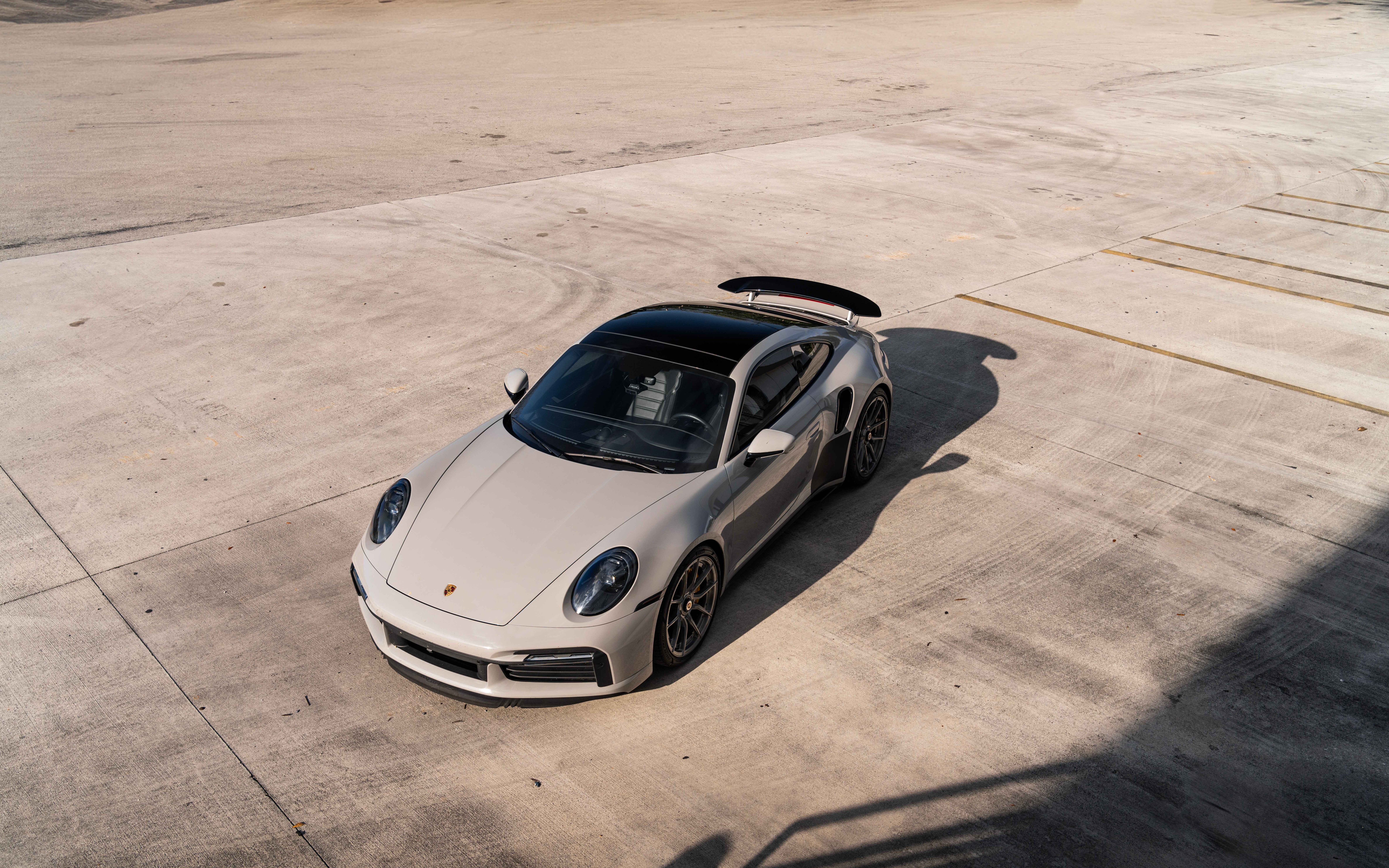 A sleek and modern Porsche sports car showcasing its aerodynamic design and polished exterior.