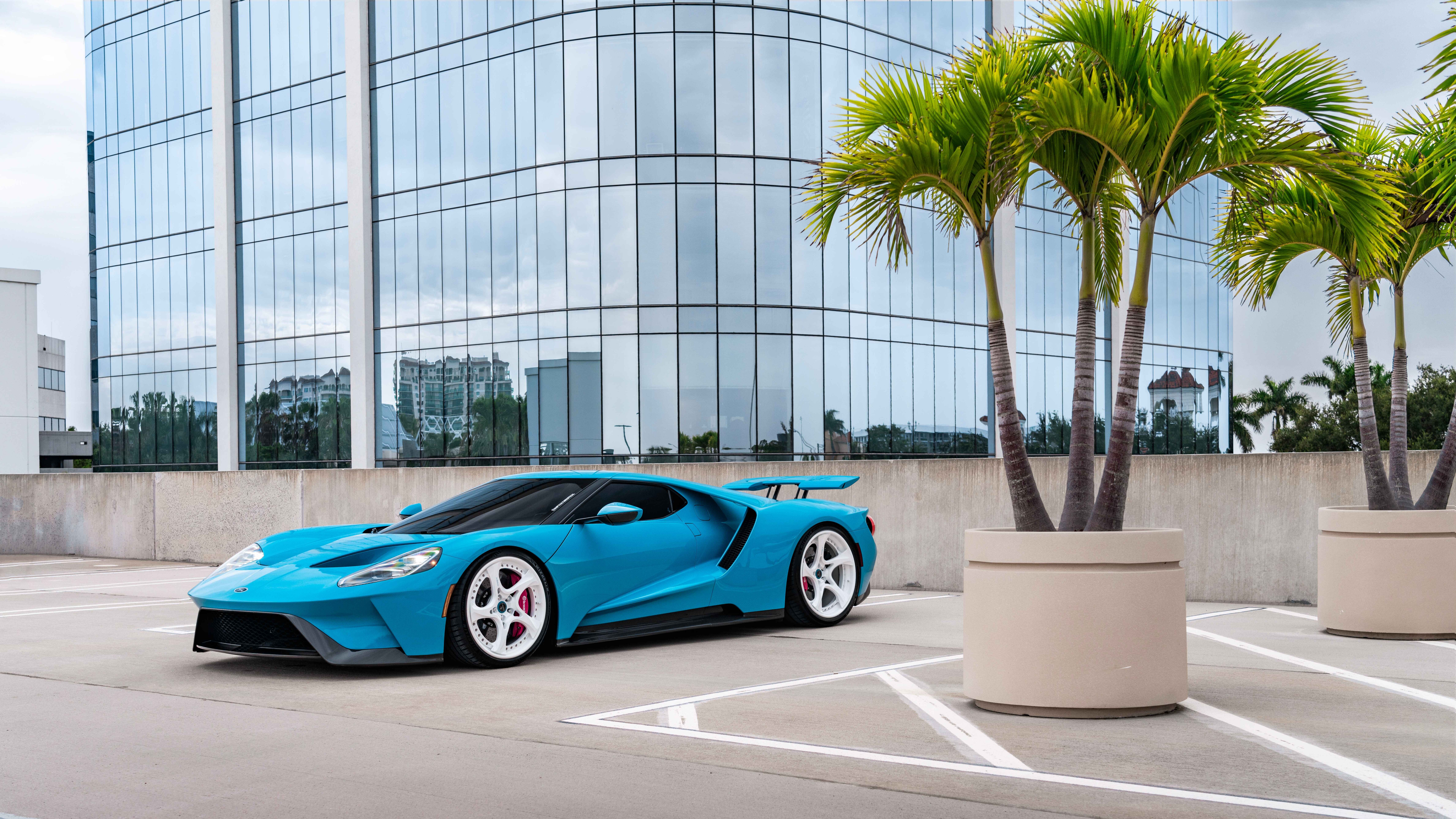 A sleek and powerful Ford GT supercar featuring its signature aerodynamic body and high-performance design.