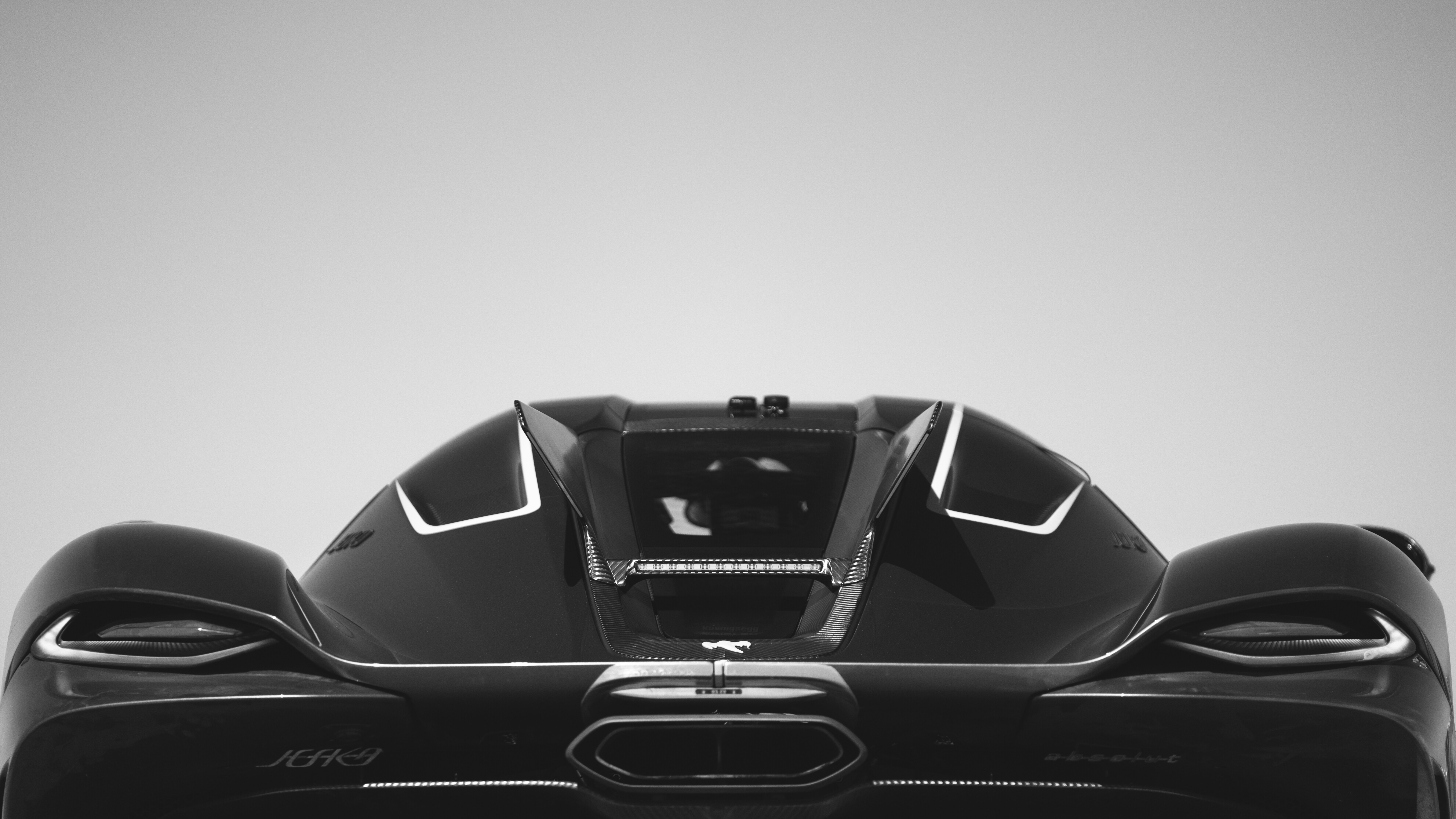 A detailed view of the aerodynamic Koenigsegg Jesko Absolut hypercar.