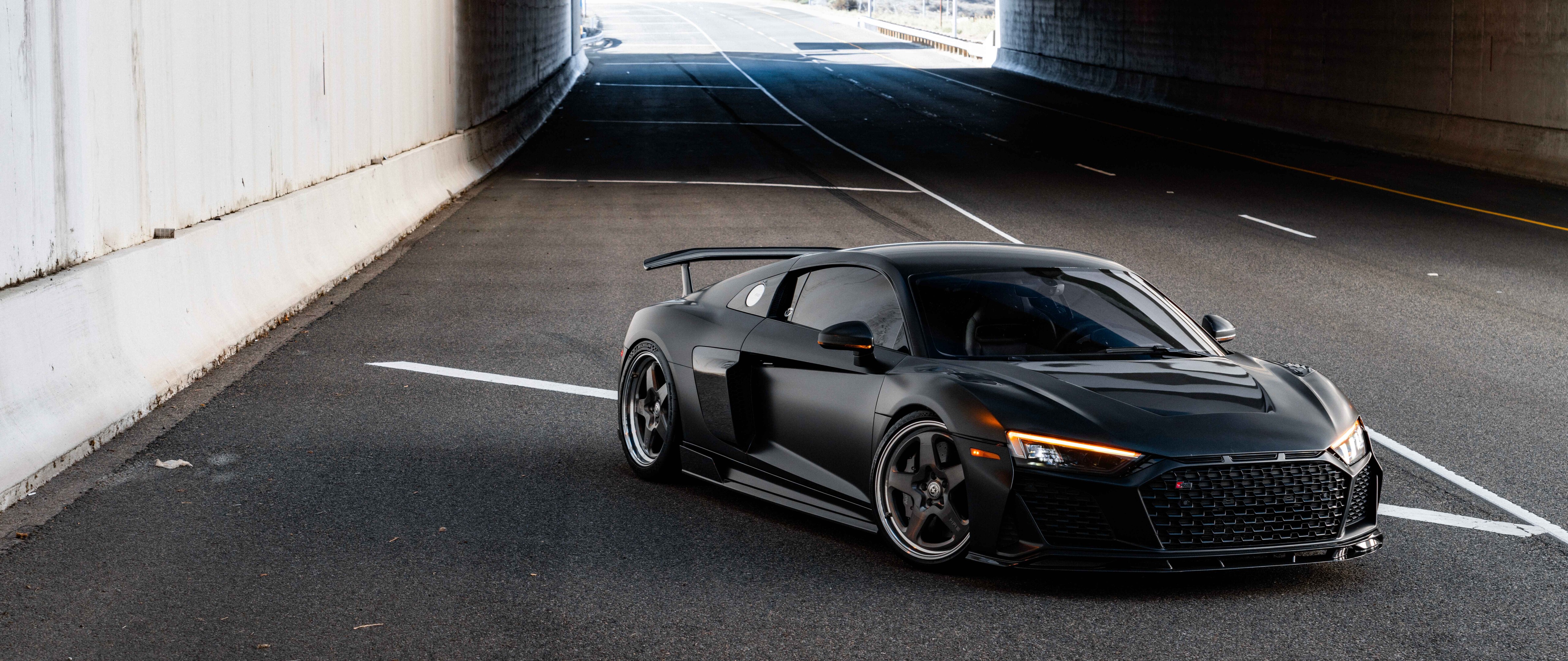 A close-up view of a sleek and modern Audi luxury car with a polished exterior.