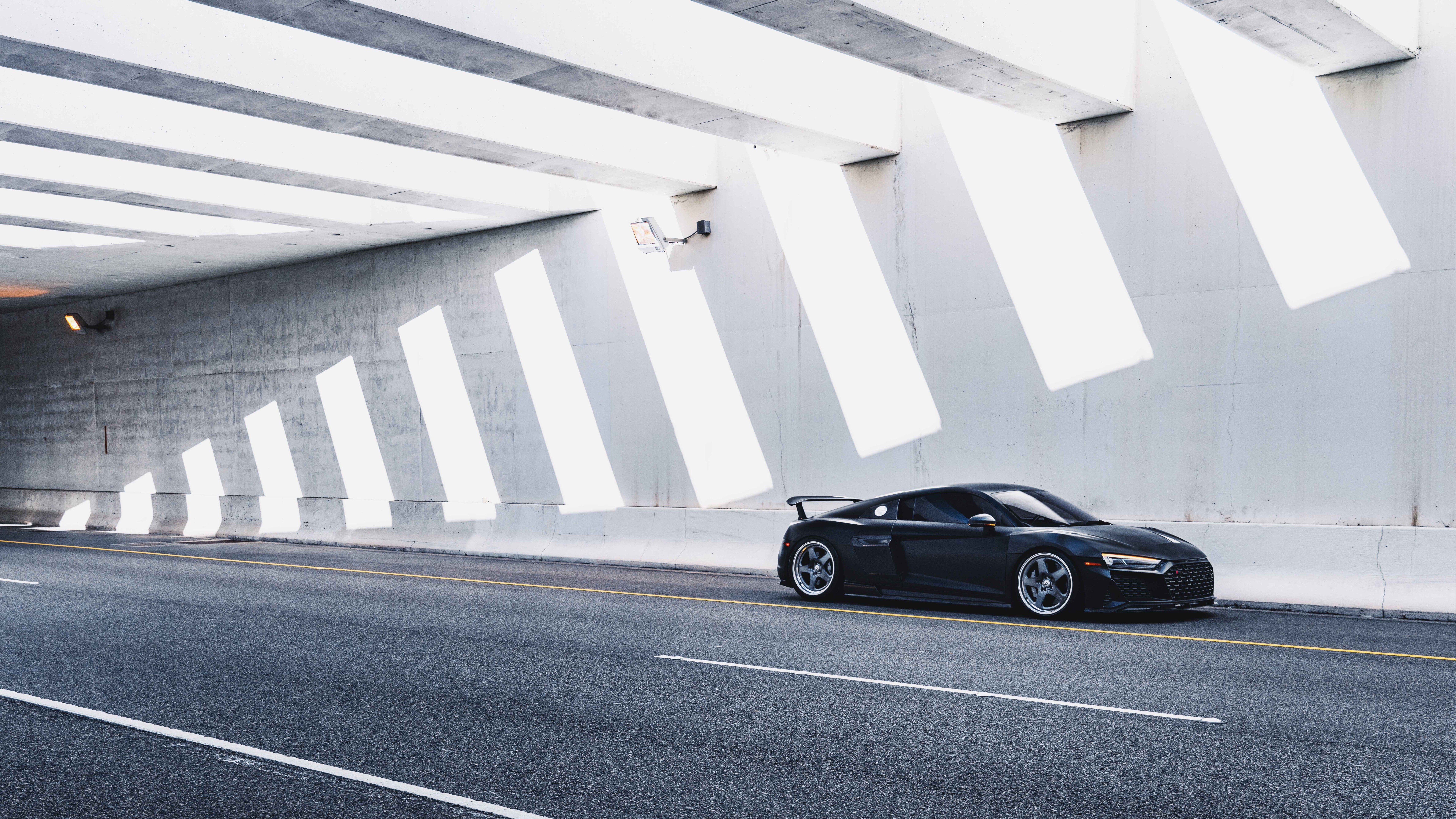 A close-up view of a sleek, modern Audi luxury car showcasing its elegant lines and polished exterior.