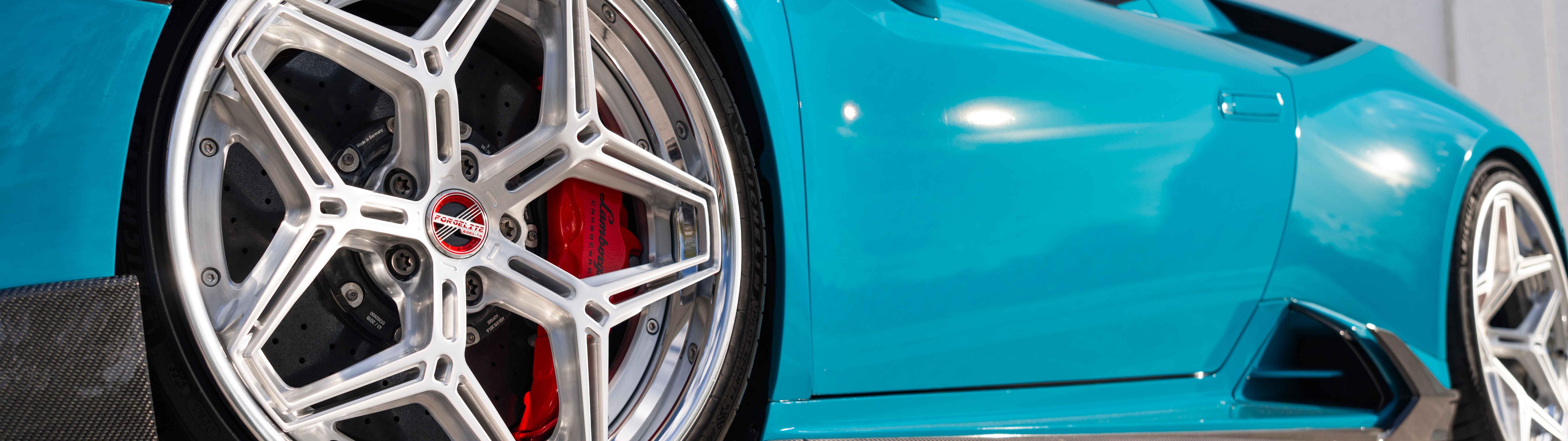 A detailed view of a Lamborghini Huracan Evo showcasing its aerodynamic body and modern supercar design.