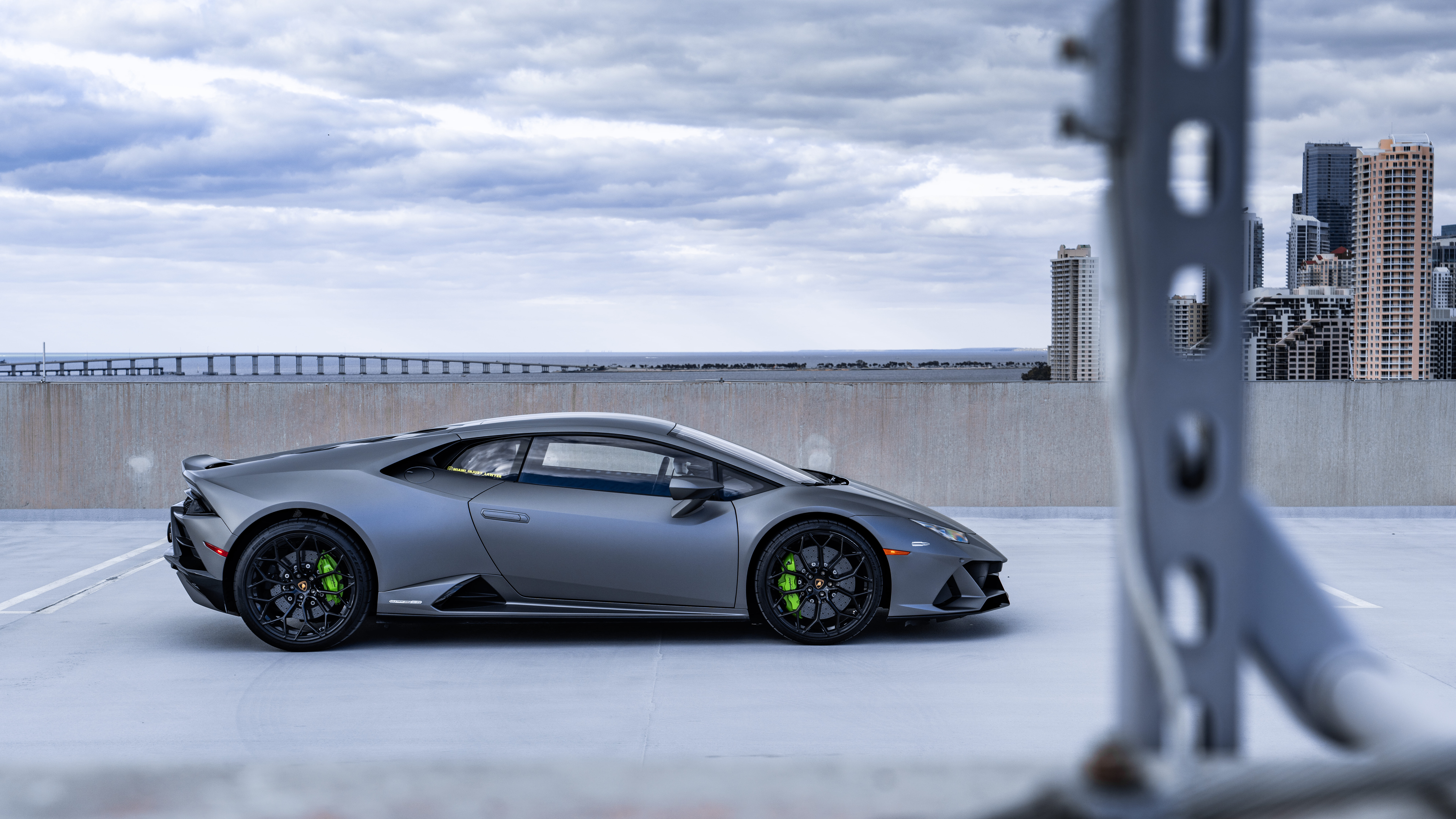 A close-up view of a powerful Lamborghini Huracan sports car highlighting its aerodynamic curves.
