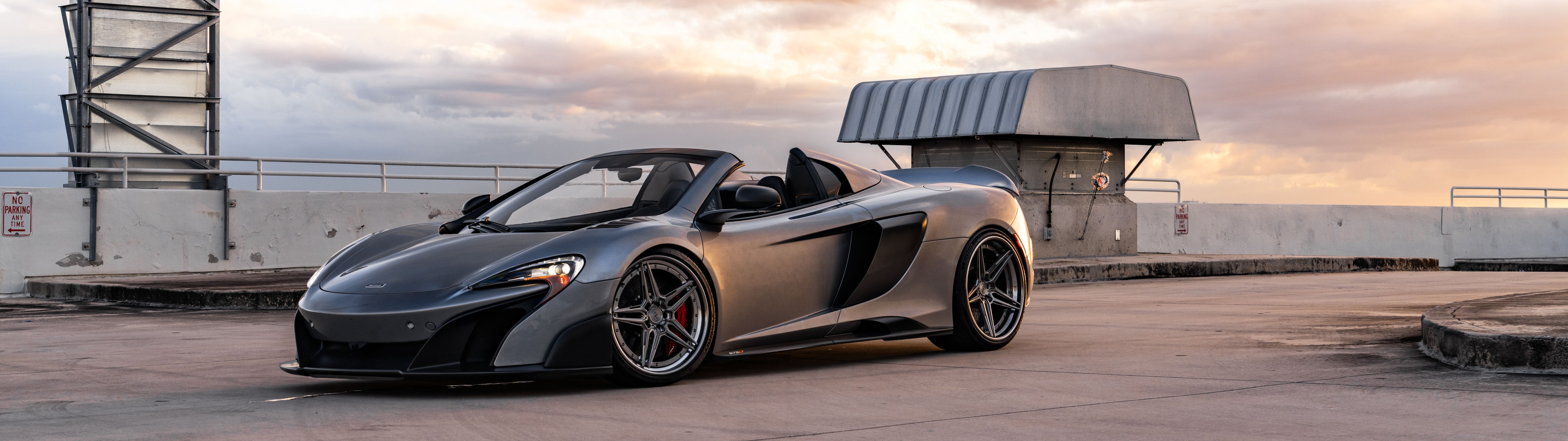A sleek and aerodynamic McLaren supercar captured in a high-detail shot.
