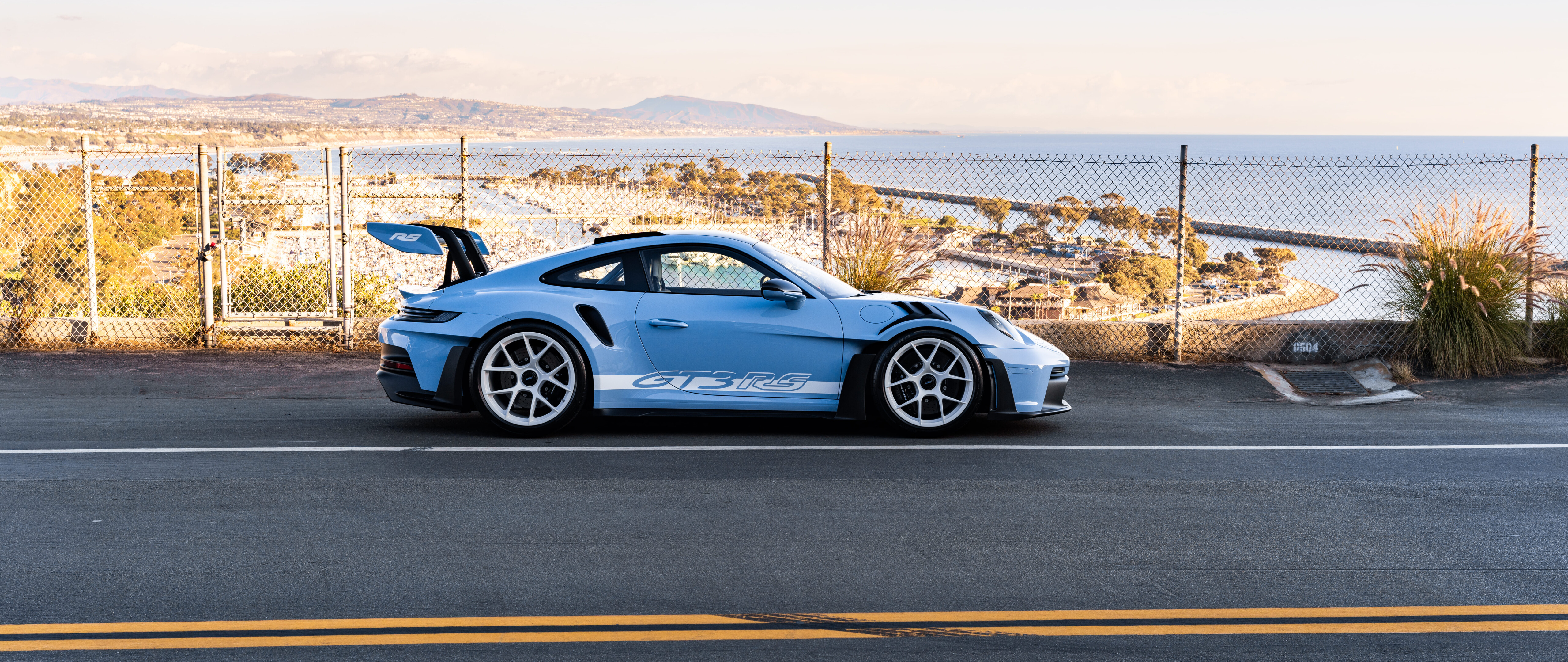 A sleek and polished Porsche sports car featuring modern aerodynamic design.