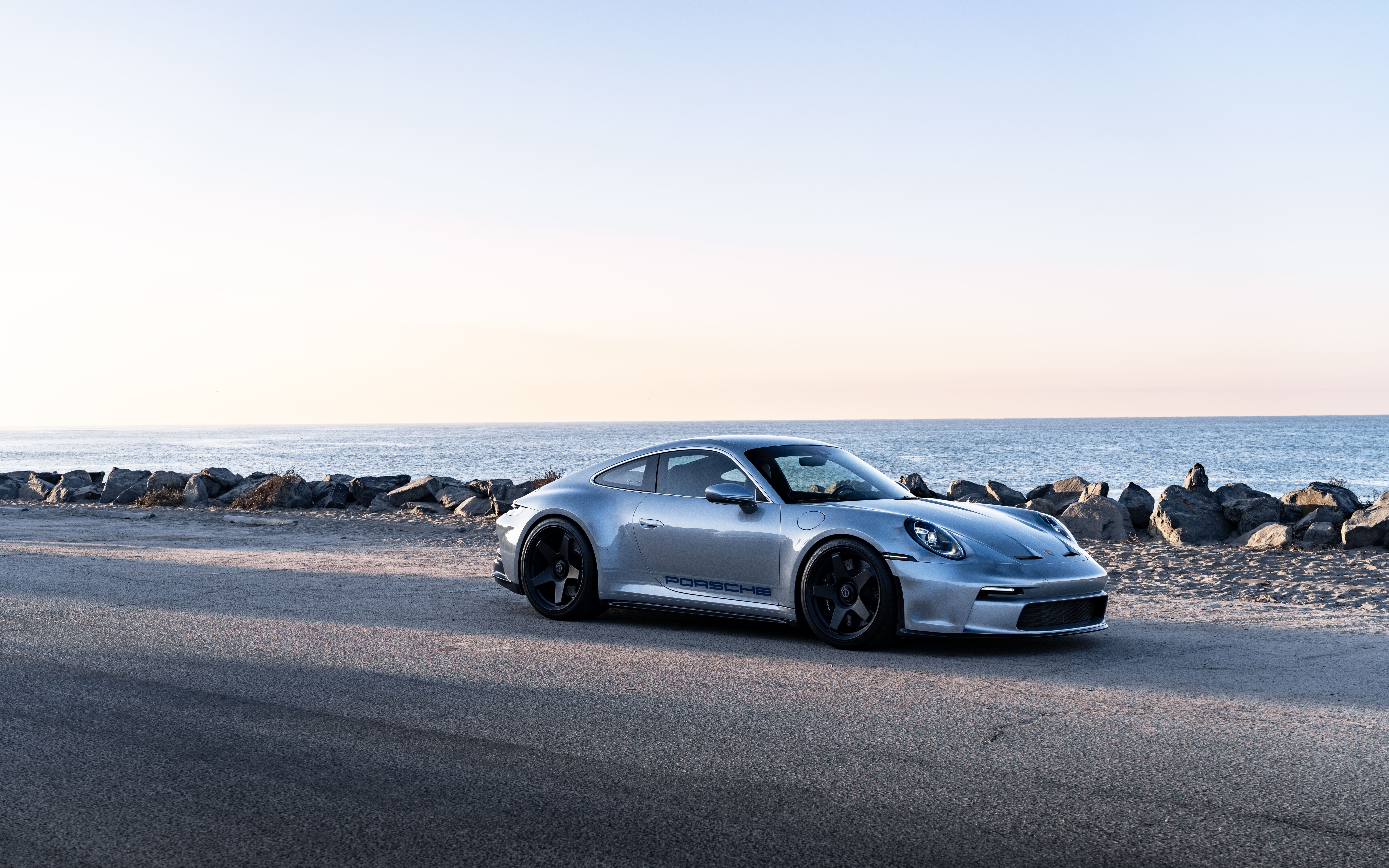 A high-resolution close-up of a Porsche GT3 RS sports car.
